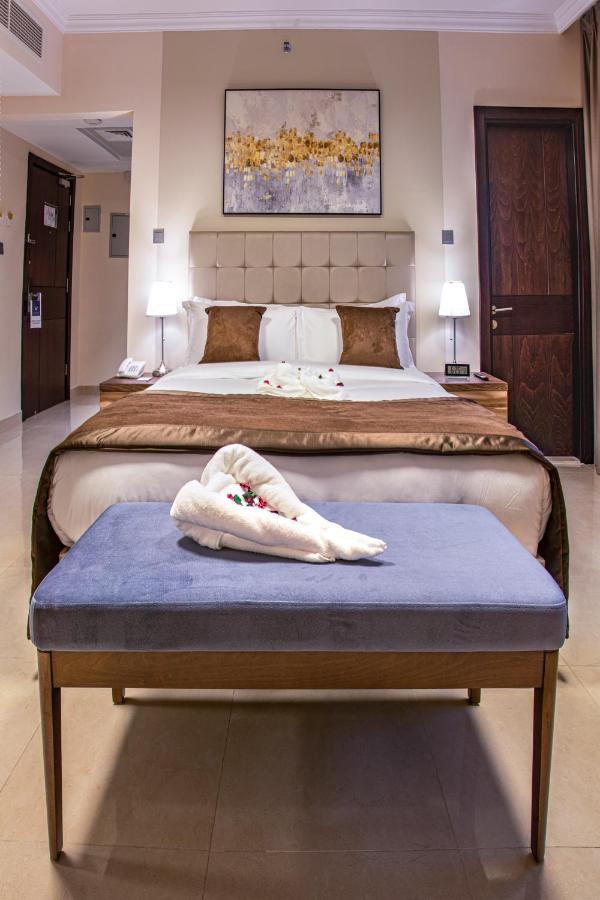 Viola Hotel Apartments Шарджа Экстерьер фото