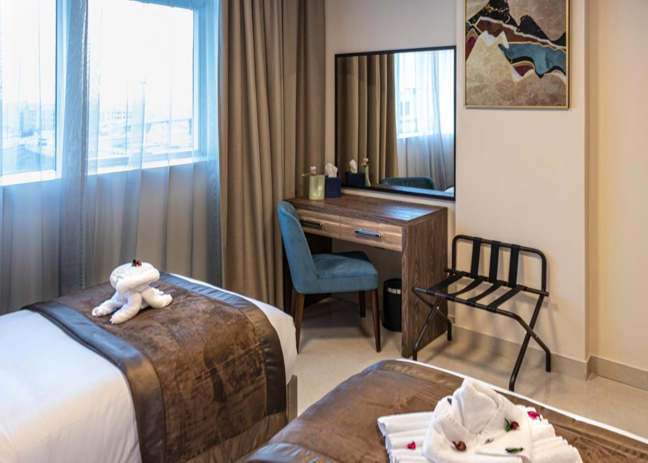 Viola Hotel Apartments Шарджа Экстерьер фото