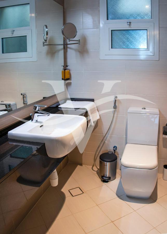 Viola Hotel Apartments Шарджа Экстерьер фото