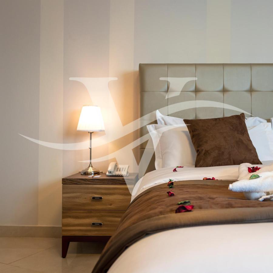 Viola Hotel Apartments Шарджа Экстерьер фото