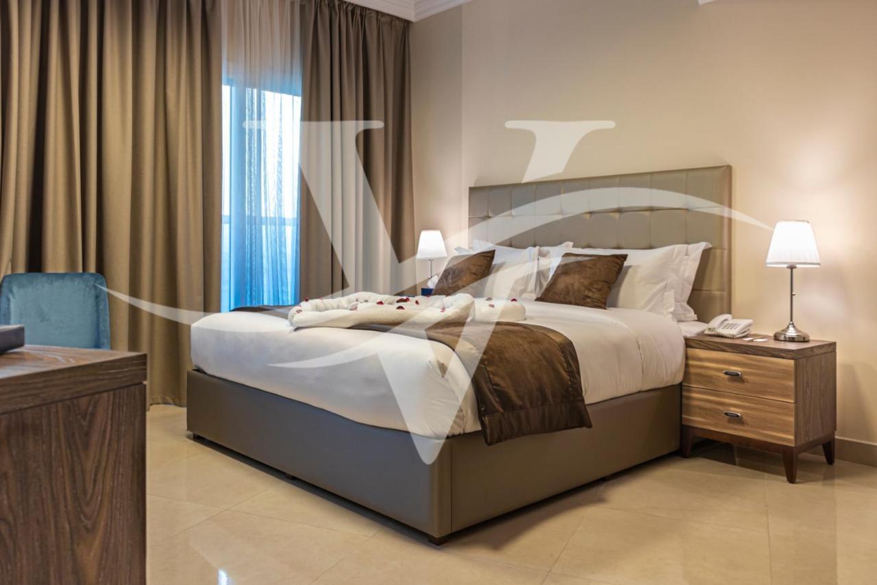 Viola Hotel Apartments Шарджа Экстерьер фото
