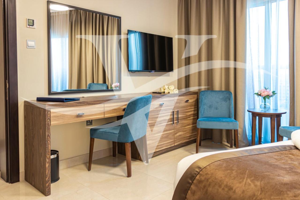 Viola Hotel Apartments Шарджа Экстерьер фото