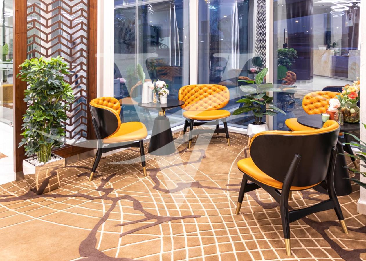 Viola Hotel Apartments Шарджа Экстерьер фото
